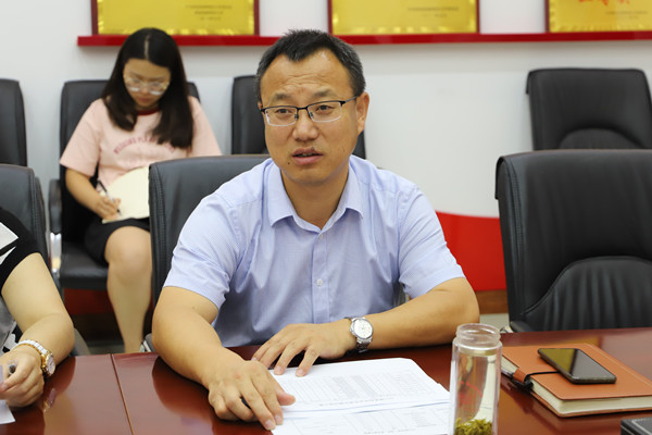 b0469c6a9f764c41bf4663d0c543ce9e.jpg 副书记王力.jpg